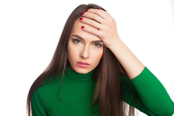 Vrouw in een groene coltrui — Stockfoto