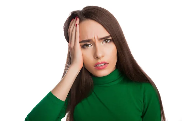 Vrouw in een groene coltrui — Stockfoto