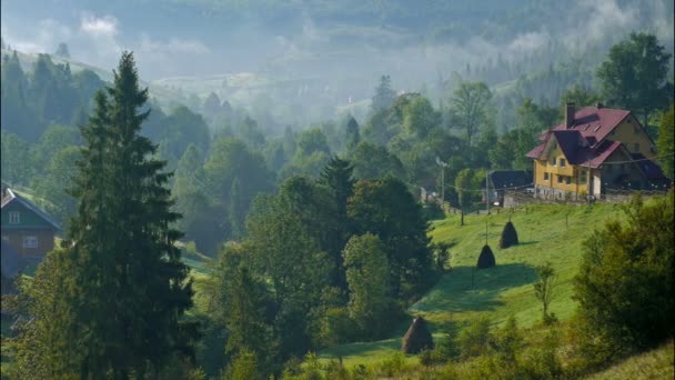 House in the foggy mountains. Carpathian, Ukraine. Timelapse — Stock Video