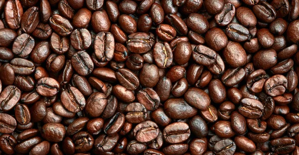 Roasted coffee beans background — Stock Photo, Image