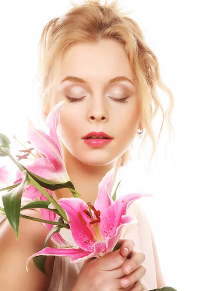 Young woman with pink lily — Stock Photo, Image