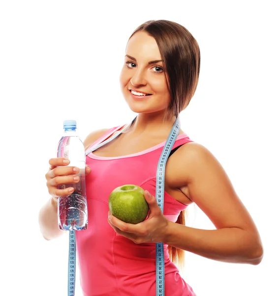 Gezonde vrouw met water en appel dieet glimlachen — Stockfoto