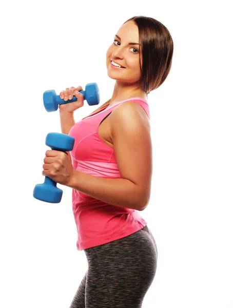 Woman in sport equipment practice with hand weights — Stock Photo, Image