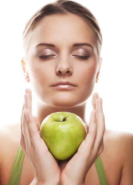 Blond woman with green apple — Stock Photo, Image