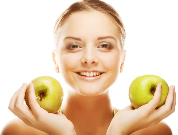 Smiling woman with green apple. Royalty Free Stock Photos