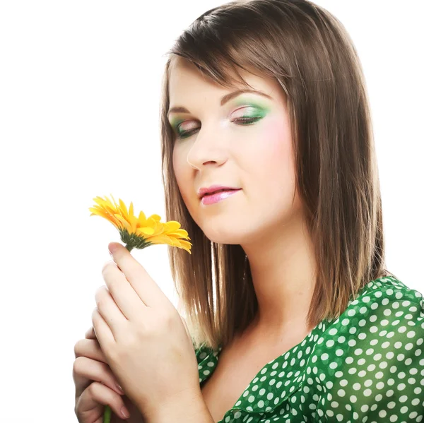 Young woman with gerber flower — Stock Photo, Image