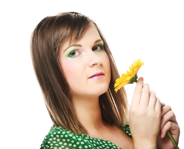 Young woman with gerber flower — Stock Photo, Image