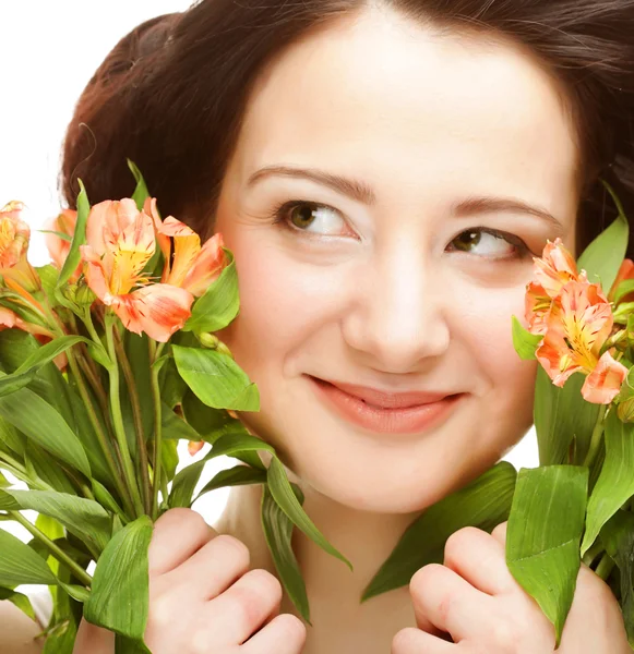 Woman fith bright pink-yellow flowers — Stock Photo, Image