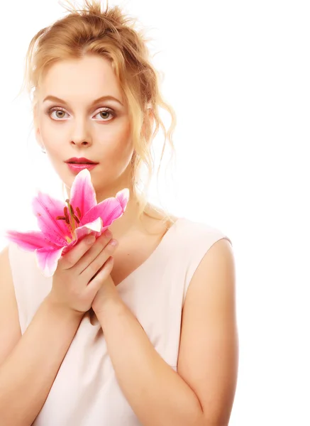 Young woman with pink lily — Stock Photo, Image