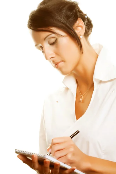 Young businesswoman write. Stock Photo