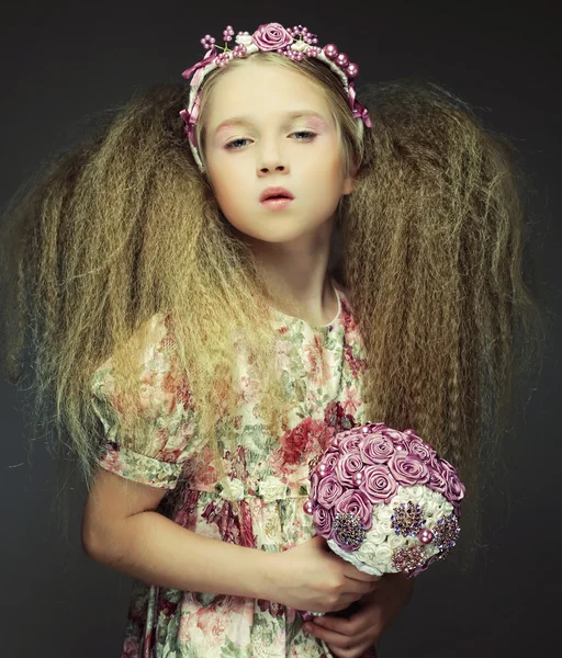 Little lady with bouquet — Stock Photo, Image