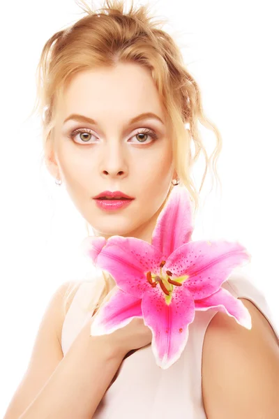 Young woman with pink lily — Stock Photo, Image