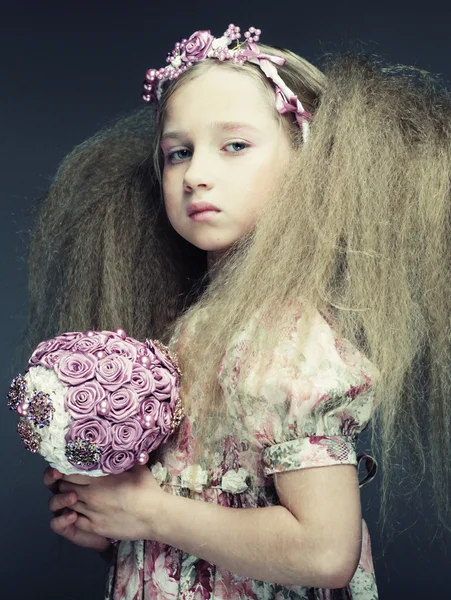 Little lady with bouquet — Stock Photo, Image