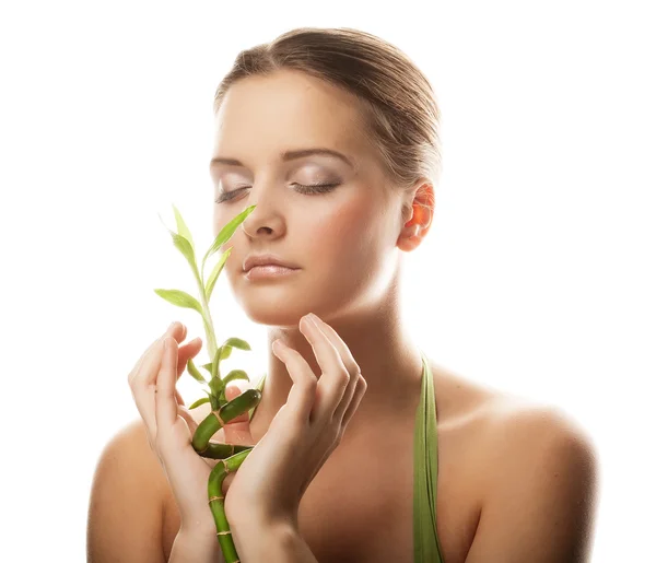 Young beautiful woman with bamboo — Stock Photo, Image