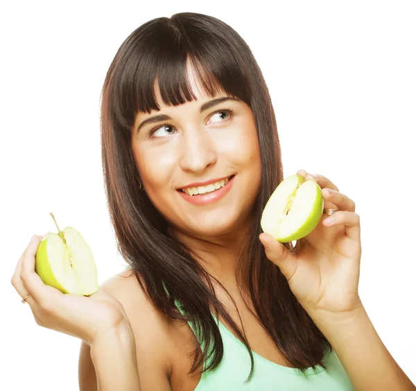 Jovem mulher feliz segurando maçãs verdes. — Fotografia de Stock