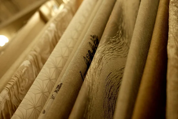 Rolls of fabric and textiles in store — Stock Photo, Image