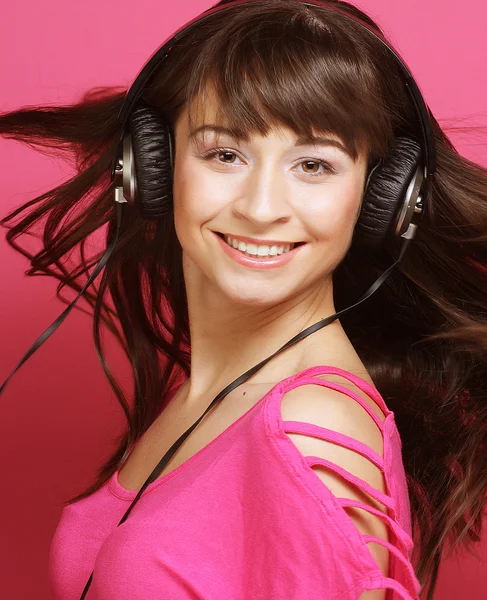 Hermosa mujer con auriculares — Foto de Stock