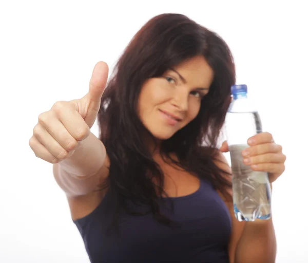 Sportovní žena s lahví vody — Stock fotografie