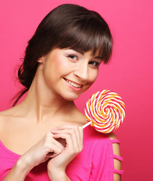 Pretty woman with lollipop — Stock Photo, Image