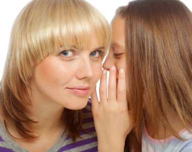 young girl whispering secrets in her mommys ear clipart