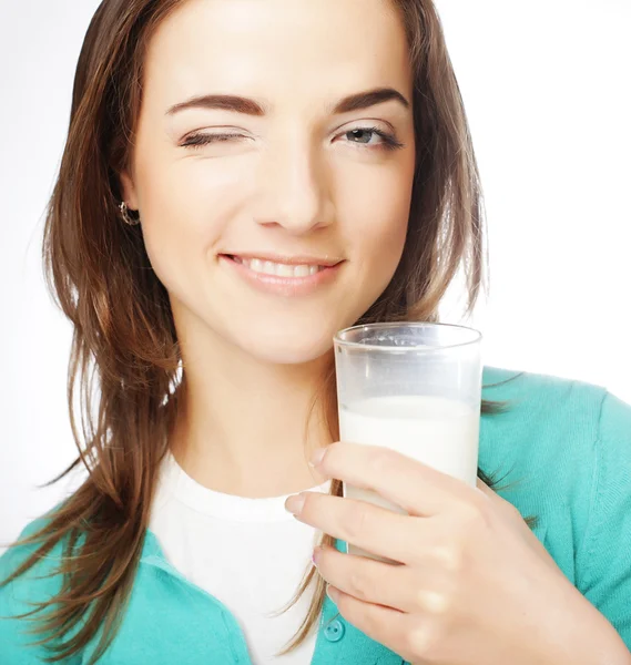 Young lady having a glass of milk — Stock Photo, Image