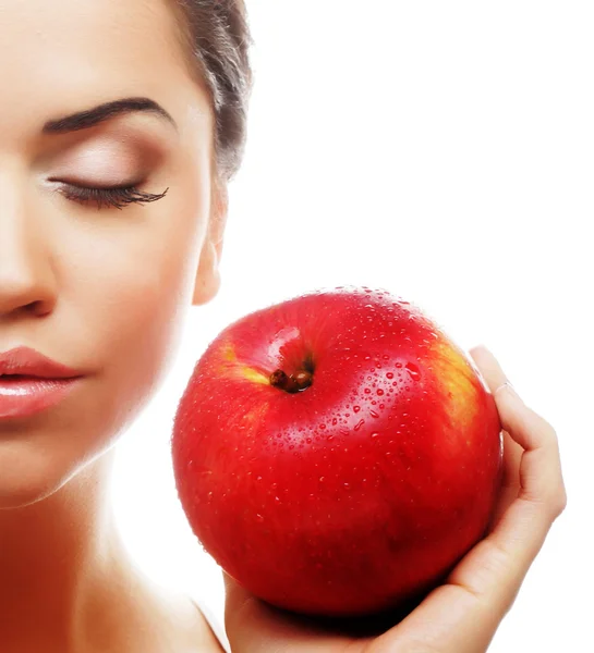Attraente giovane donna con una mela — Foto Stock