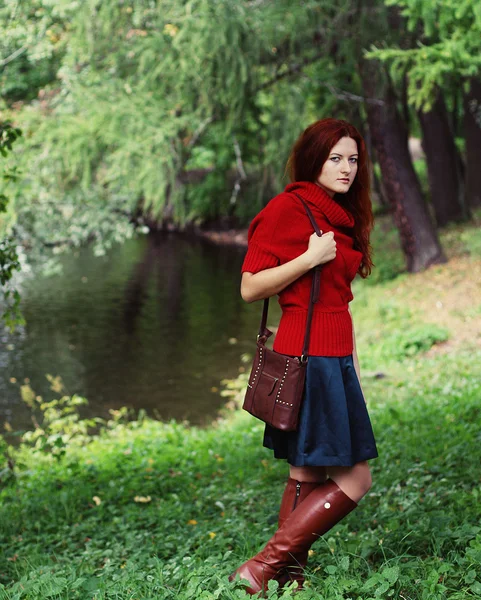 Fashion happy woman near the river — Stock Photo, Image