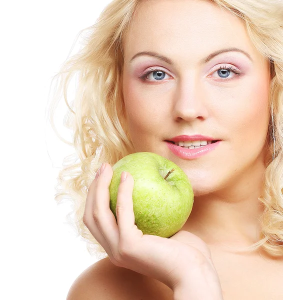 Woman holding green apple Royalty Free Stock Photos