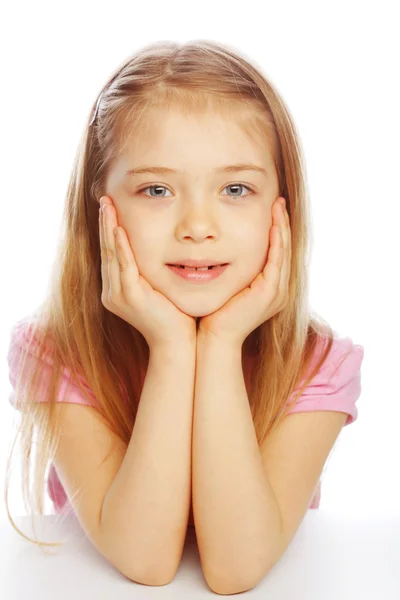 Smiling little girl on white background in studio — Stock Photo, Image