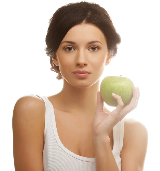 Beautiful young woman with green apple — Stock Photo, Image