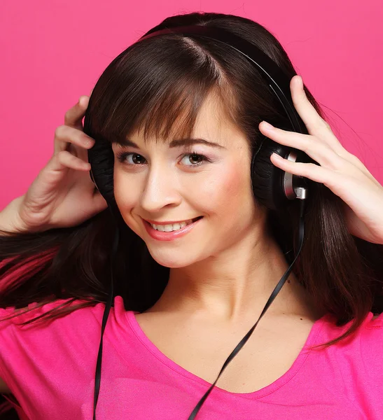 Hermosa mujer con auriculares —  Fotos de Stock