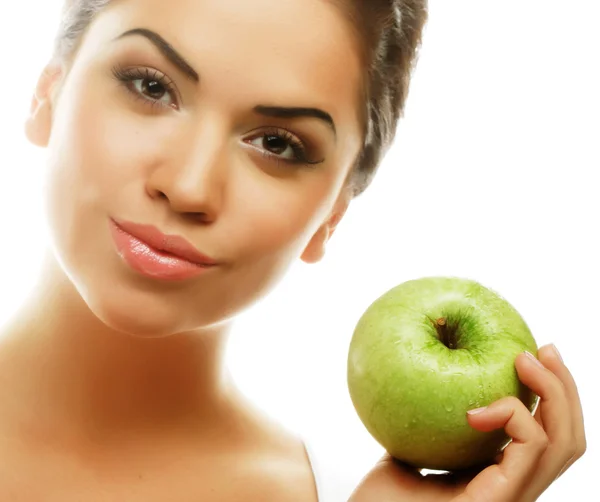 Head shot of woman holding apple Stock Photo