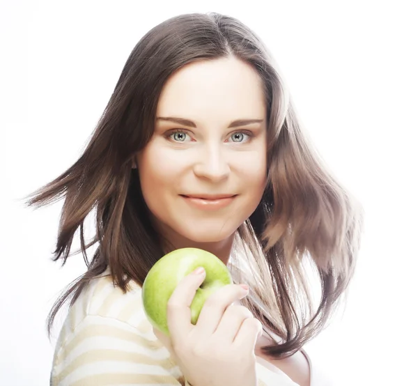 Portrait of young woman with green apple — Stock Photo, Image