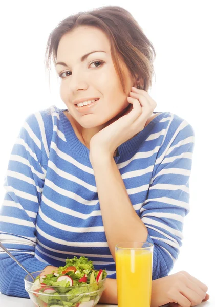 Young woman has breakfast salad — Stock Photo, Image