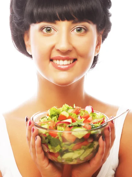 Young funny woman eating salad — Stock Photo, Image