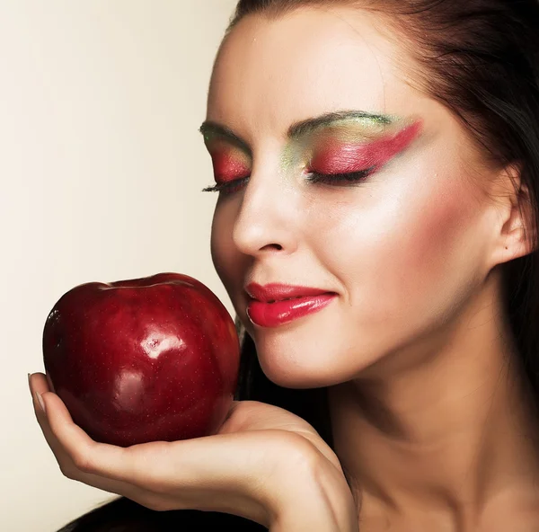 Woman with red apple — Stock Photo, Image