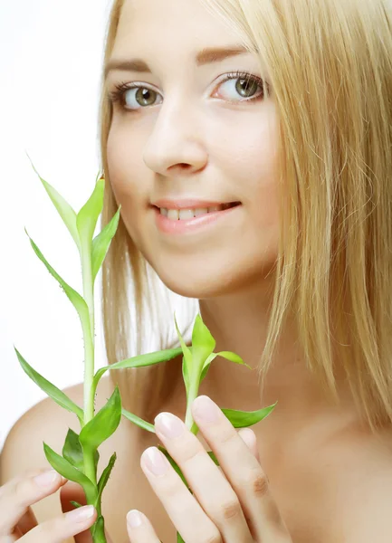 Young woman with bamboo. — Stock Photo, Image