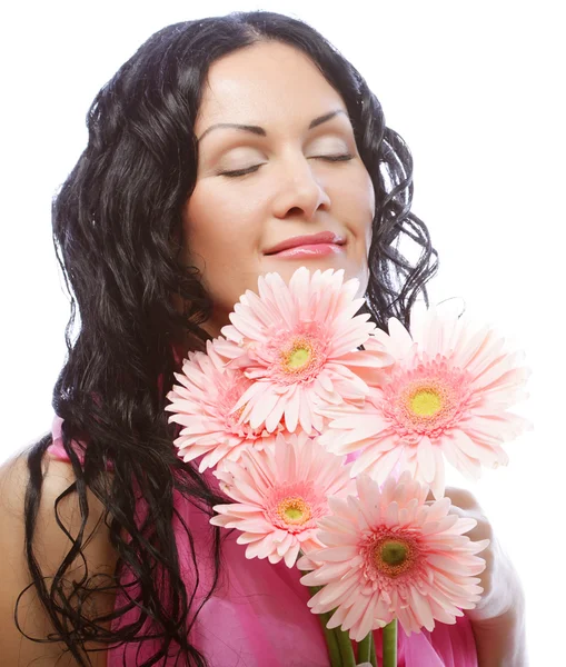 魅力的な若い女性の顔の花を持つ — ストック写真