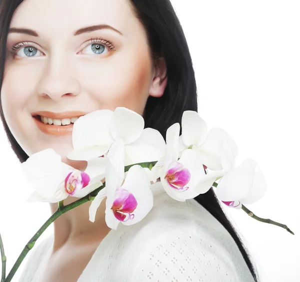 Woman with orchid flower — Stock Photo, Image