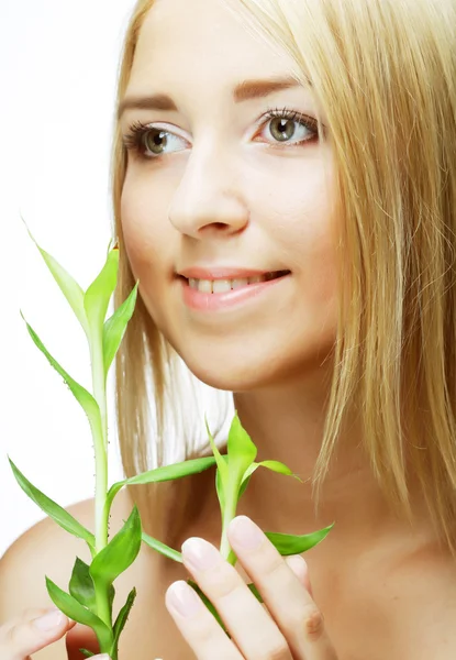 Young woman with bamboo. — Stock Photo, Image