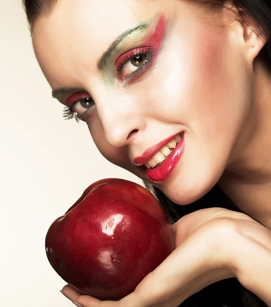 Woman with red apple — Stock Photo, Image