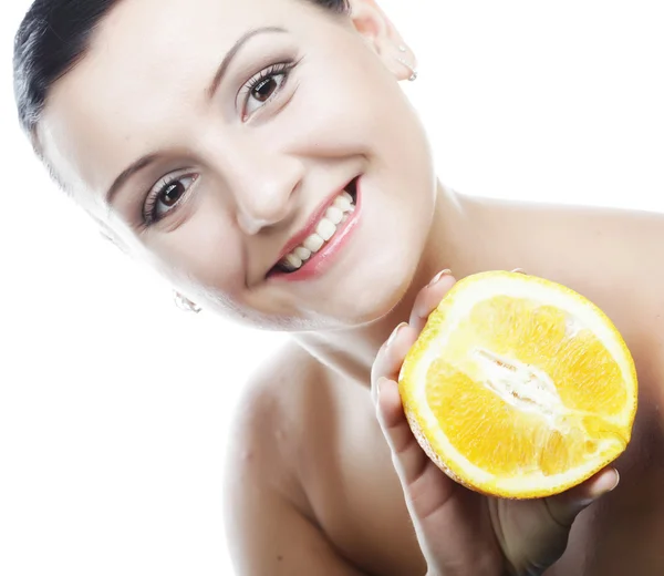 Woman with oranges in her hands — Stock Photo, Image