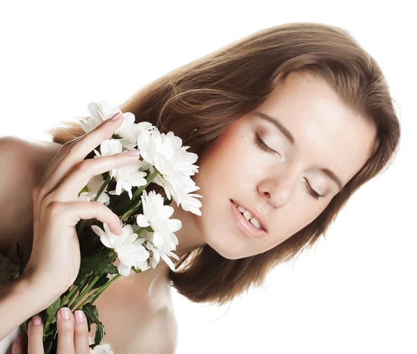 Mooie vrouw met bloemen — Stockfoto