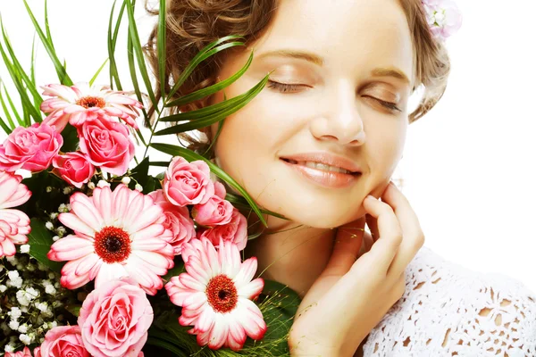 Beautiful young woman with bouquet flowers — Stock Photo, Image