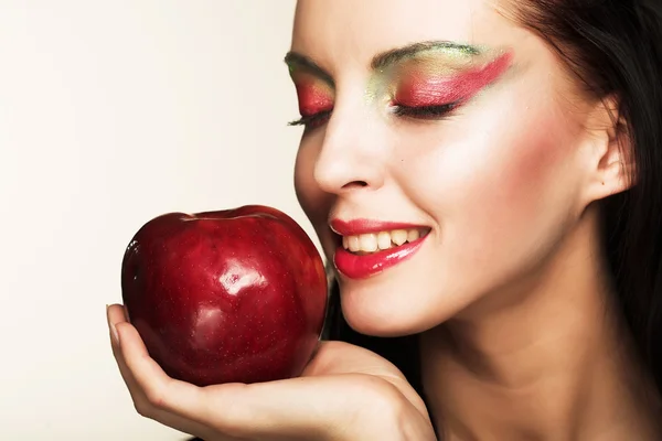 Woman with red apple — Stock Photo, Image