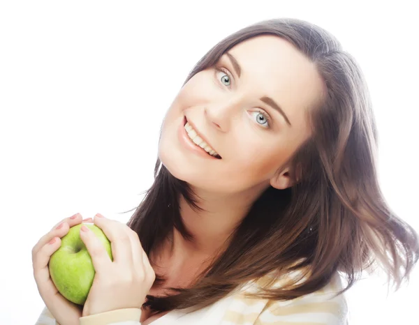 Portret van een jonge vrouw met groene apple — Stockfoto