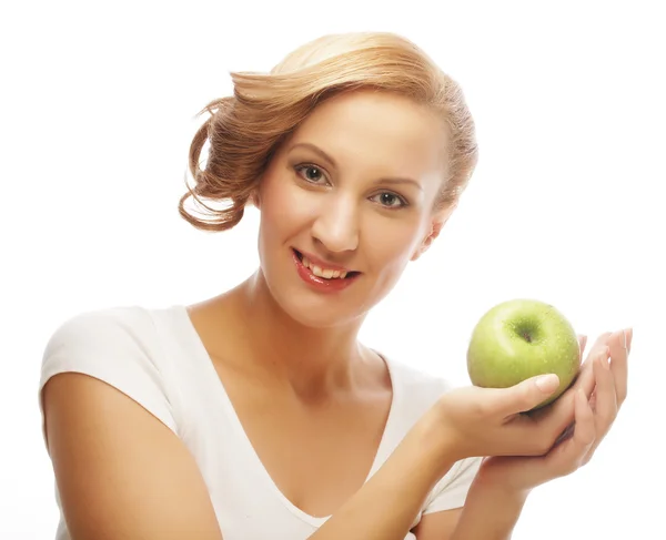 Frau mit grünem Apfel. — Stockfoto