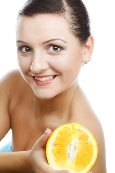 Woman with oranges in her hands — Stock Photo, Image