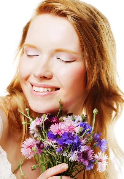 Young beautiful woman with flowers — Stock Photo, Image