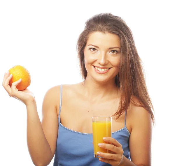 Woman holding orange and orange juice Stock Photo